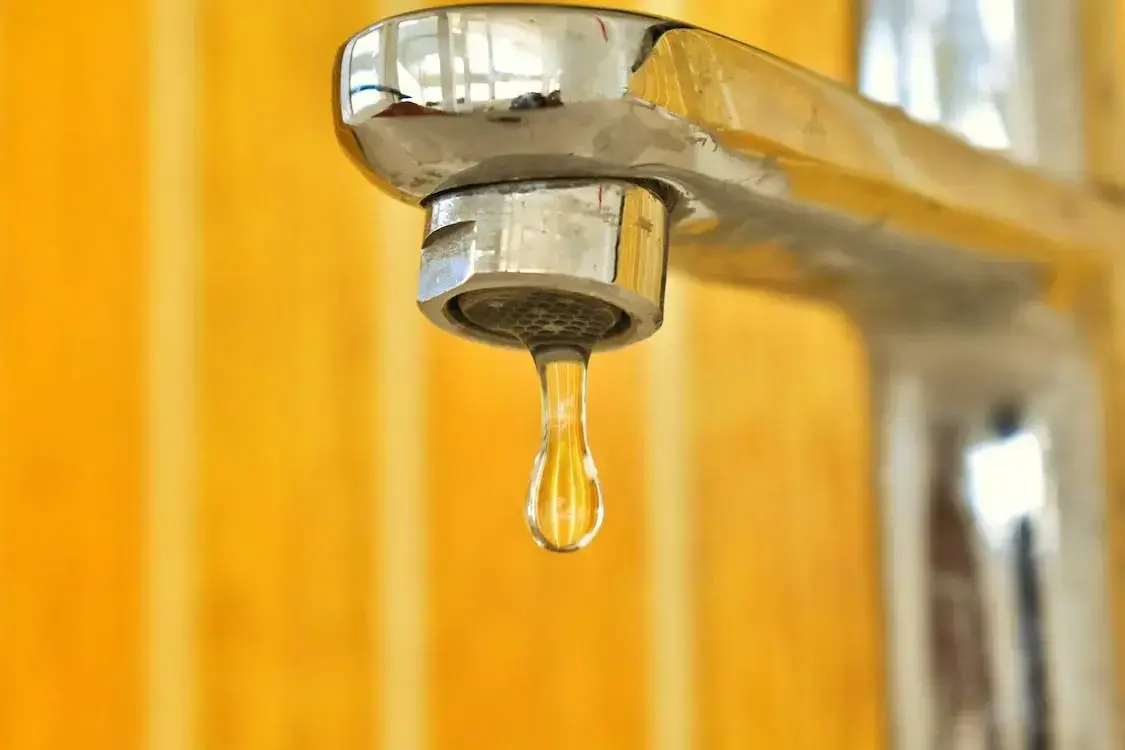 a dripping tap - leaking faucet