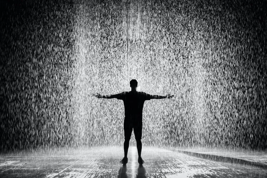 rain water pouring on a man